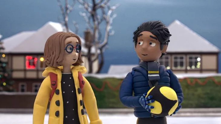 Still image of animated boy and girl from John Lewis's "Give a Little Love" commercial.
