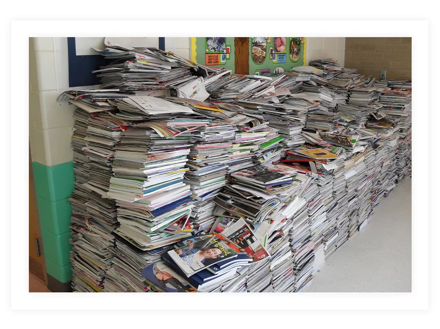 Visual presenting the average school paper waste in America